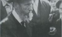 Rabbi Elizer Silver Standing, Surrounded by Young Boys