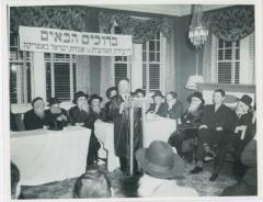 Rabbi Eliezer Silver speaking at an Agudath Israel Convention, also seen in the picture are Rabbi Aharon Kotler and Rabbi Moshe Feinstein