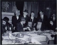 Rabbi Eliezer Silver Making a Kinyan (Acquisition) with a Chassan (Groom) while serving as Misader Kiddushin (Officiating Rabbi) at an Unidentified Wedding