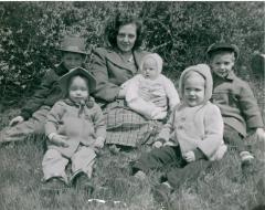 Unidentified woman and children